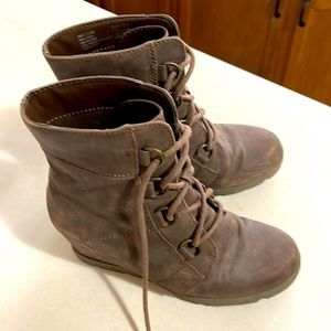 Tall brown hidden wedge lace up boot. Make an offer!